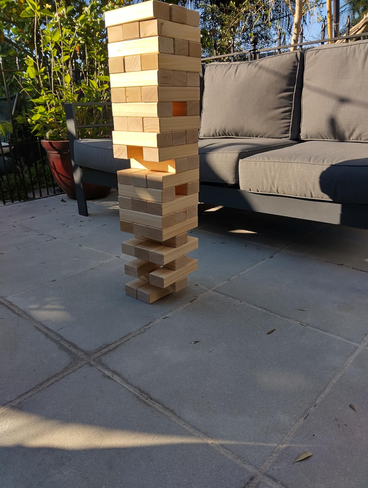 GoSports Giant Wooden Stacking Game - Stacks Up to 5 ft - Brown Wood Stain, Gray, Natural, Stars & Stripes, or Tropical Hardwood - Toppling Tower customer photo 2