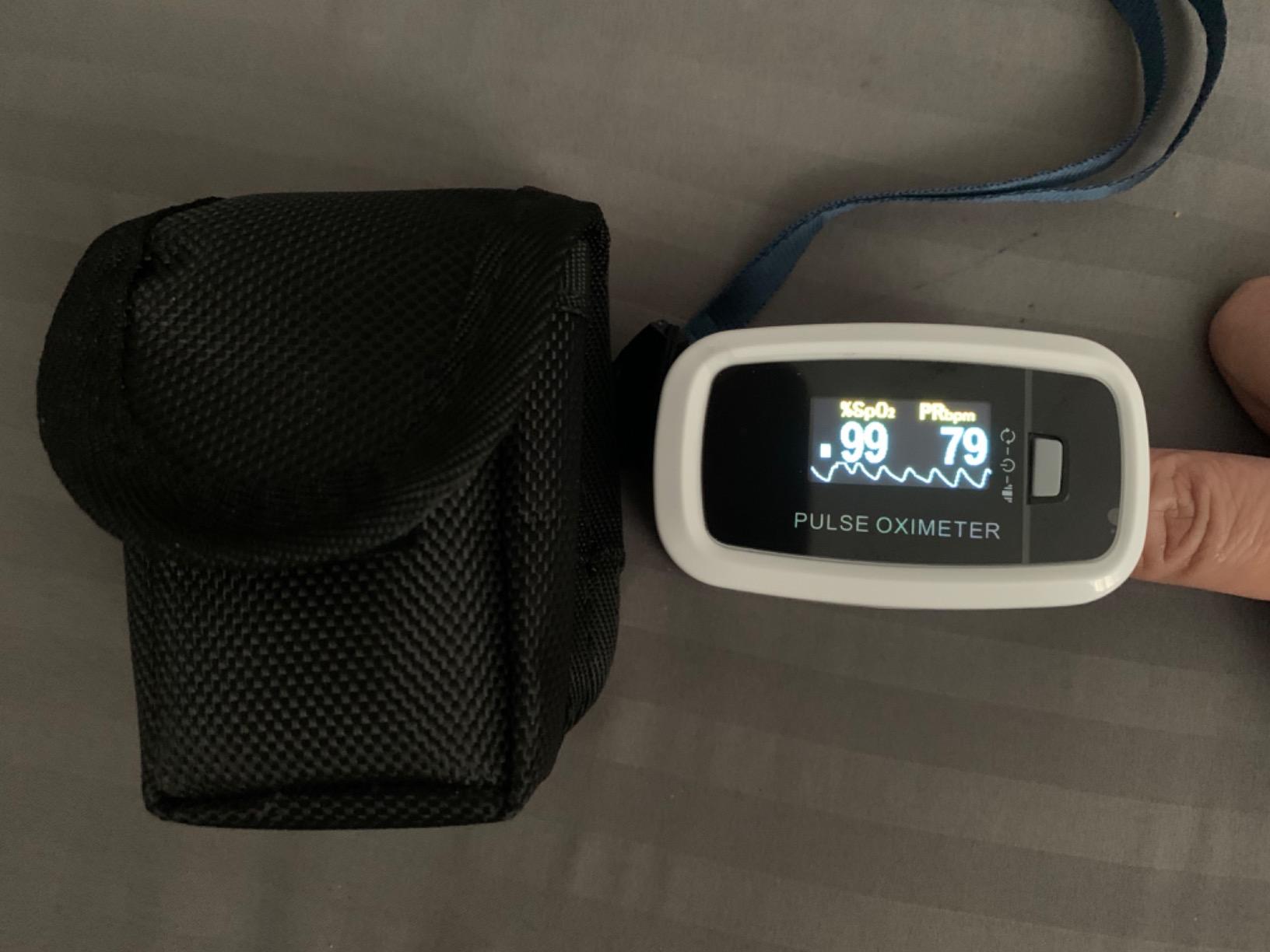 AccuMed CMS-50D1 Fingertip Pulse Oximeter Blood Oxygen Sensor SpO2 for Sports and Aviation. Portable and Lightweight with LED Display, 2 AAA Batteries, Lanyard and Travel Case (White) customer photo 2
