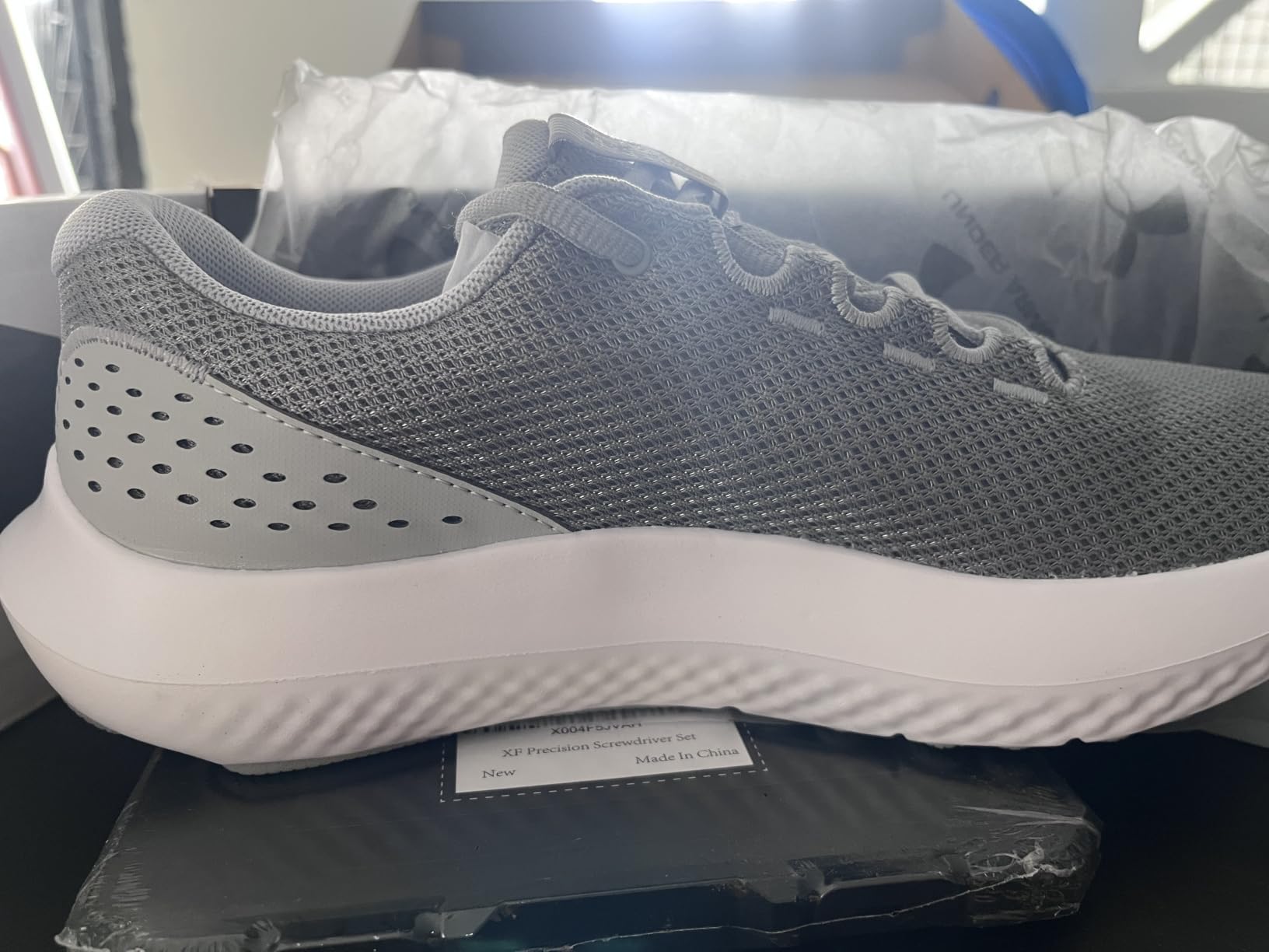 Under Armour Men's Charged Surge 4 Sneaker customer photo 1