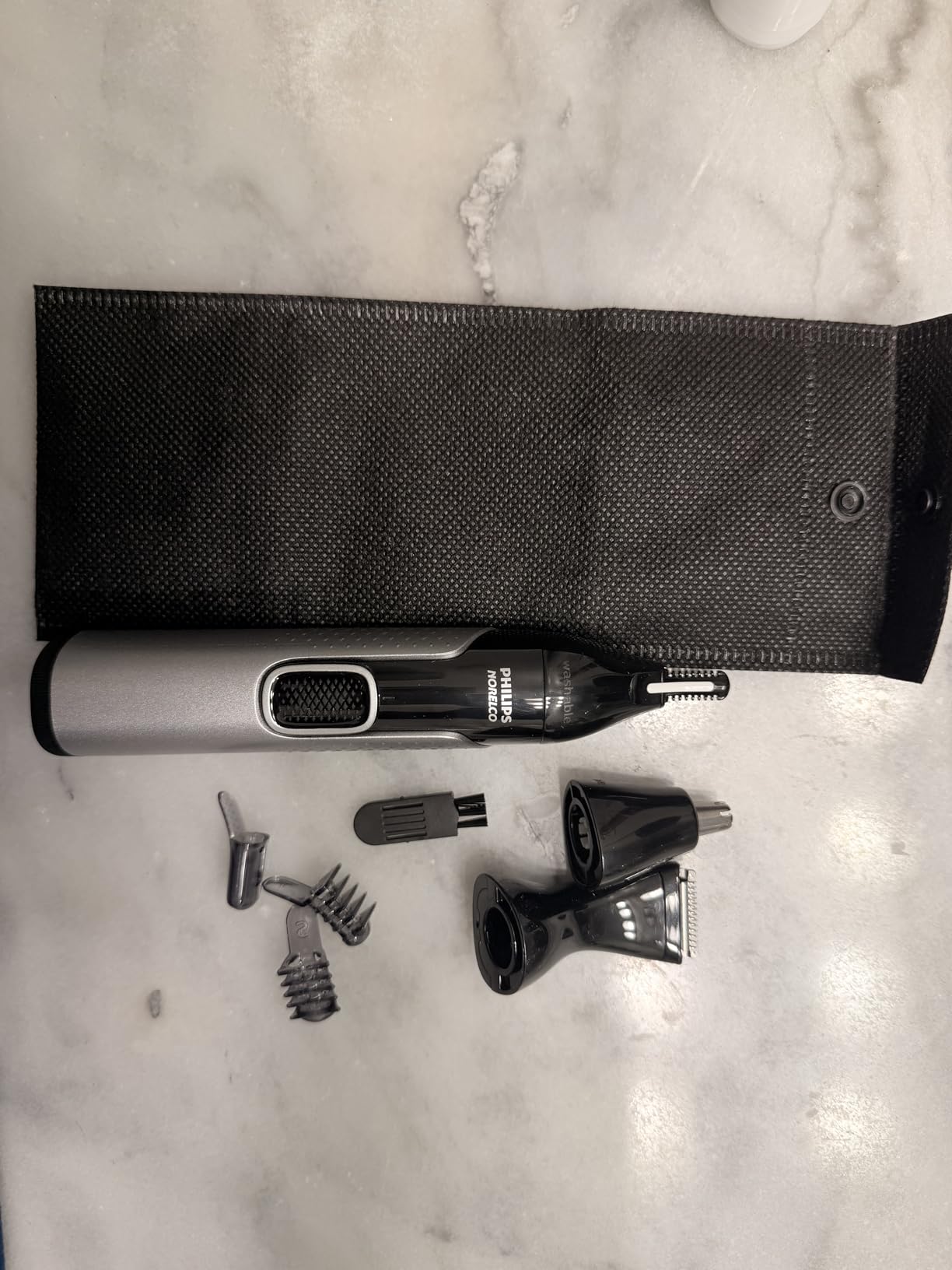 Norelco Philips Nose Trimmer 5000 for Nose, Ears, Eyebrows & Details - Protective Guard System, Dual-Sided Steel Blades, Eyebrow Combs, Rotary & Detail Trimmer, Washable, AA Battery, NT5600/62 customer photo 1