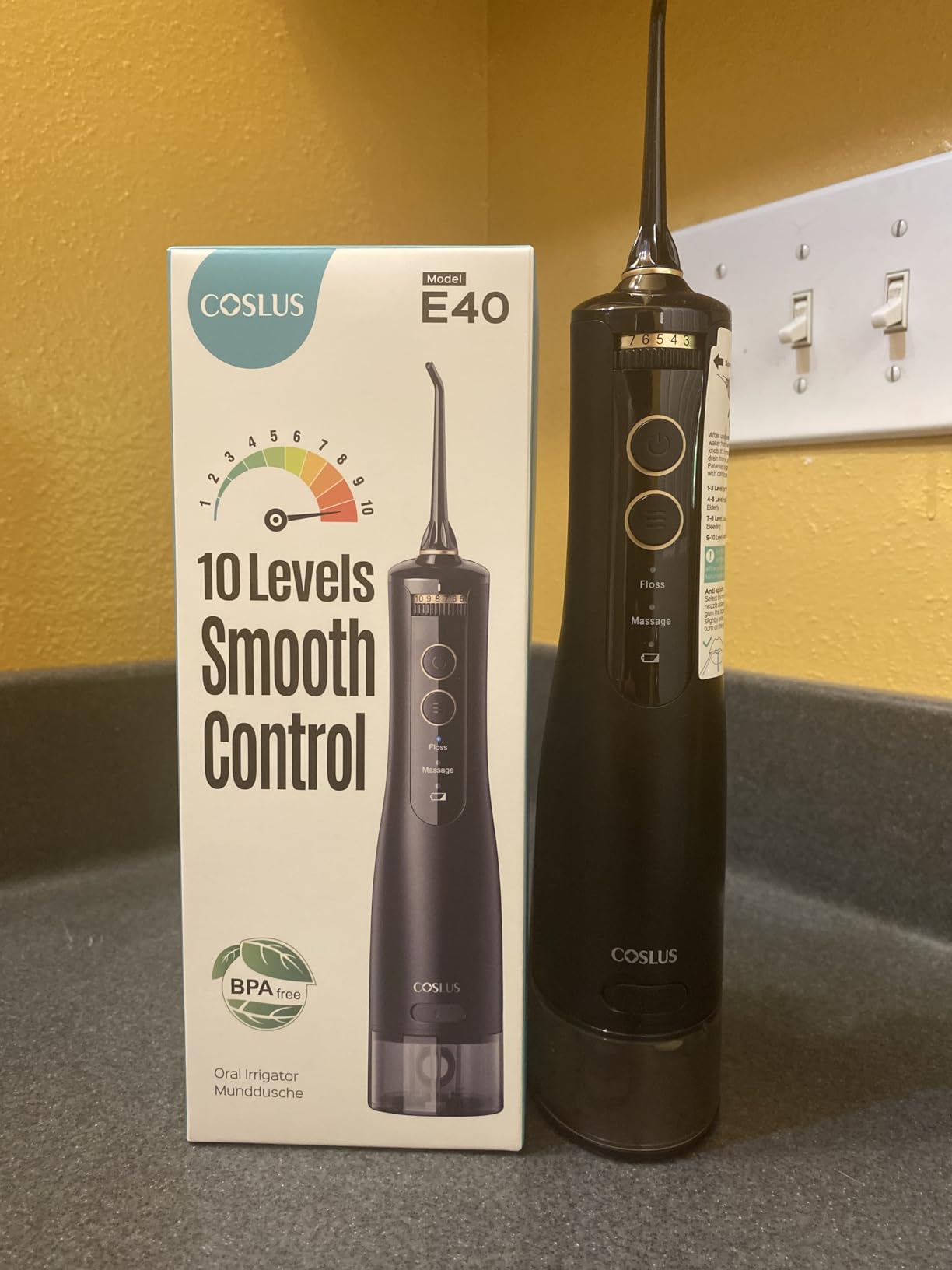 COSLUS ADA Accepted E40 Water Flosser, 10 Pressure Settings Easy to Adjust | Professional Water Dental Pick, Safe for Orthodontic, Braces & Sensitive Teeth Gums, Cordless for Travel, Family Use, Black customer photo 1