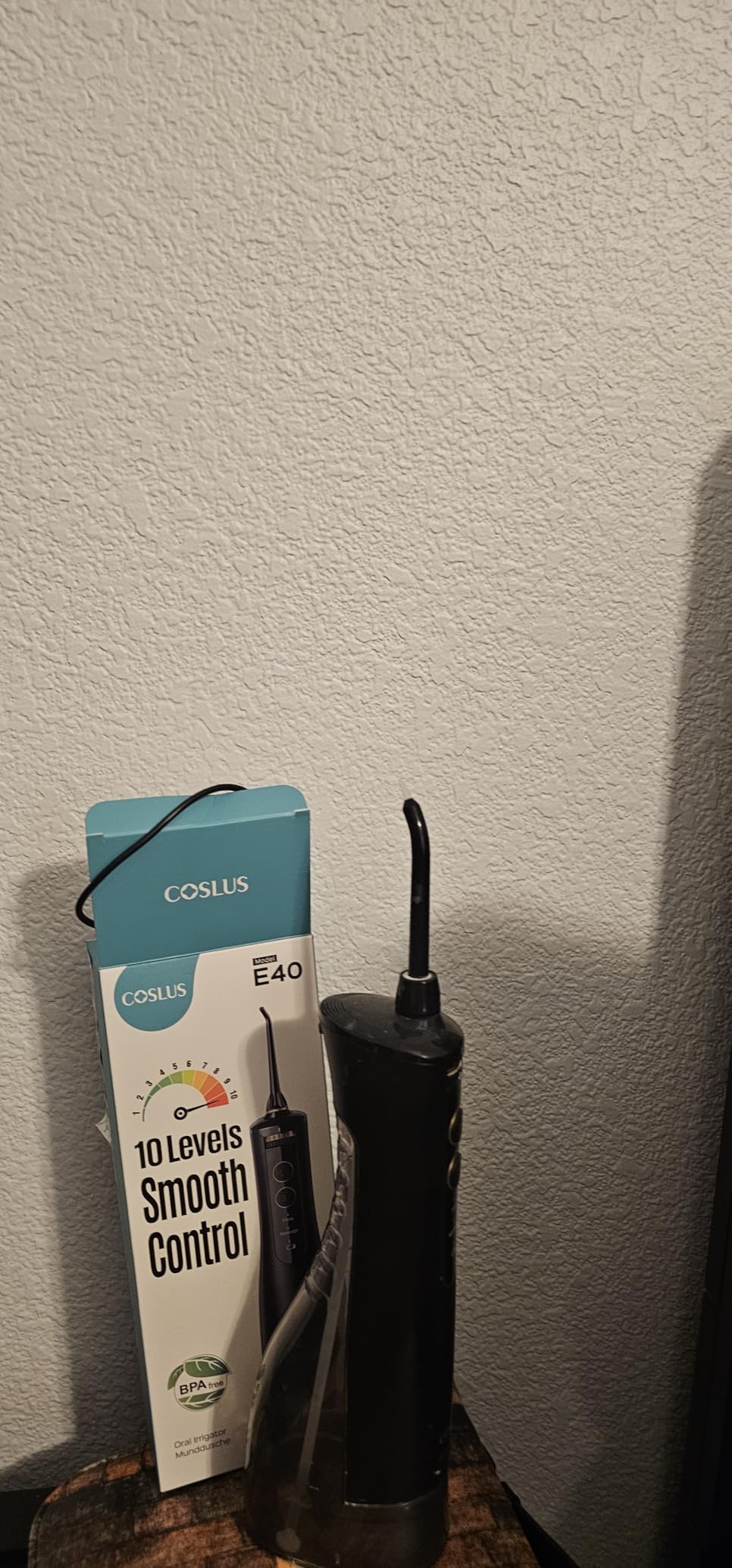 COSLUS ADA Accepted E40 Water Flosser, 10 Pressure Settings Easy to Adjust | Professional Water Dental Pick, Safe for Orthodontic, Braces & Sensitive Teeth Gums, Cordless for Travel, Family Use, Black customer photo 2