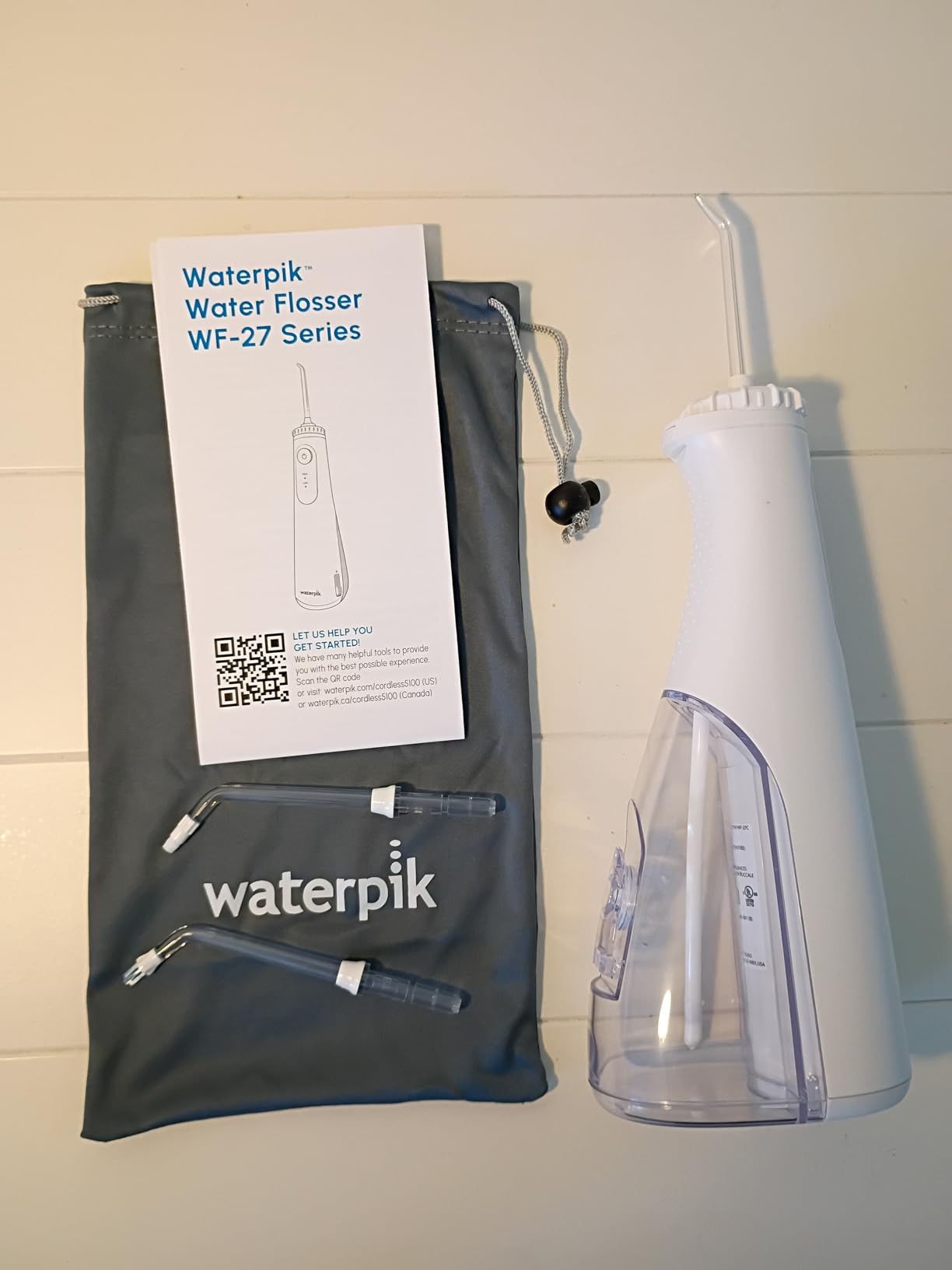 Waterpik Cordless Gem Water Flosser 5100 for Travel and Home, Rechargeable, Portable, Waterproof for Shower, Daily Gum Care, Cleaning Teeth, Braces, Implants, 3 Flossing Tips, ADA Accepted White WF-27 customer photo 1