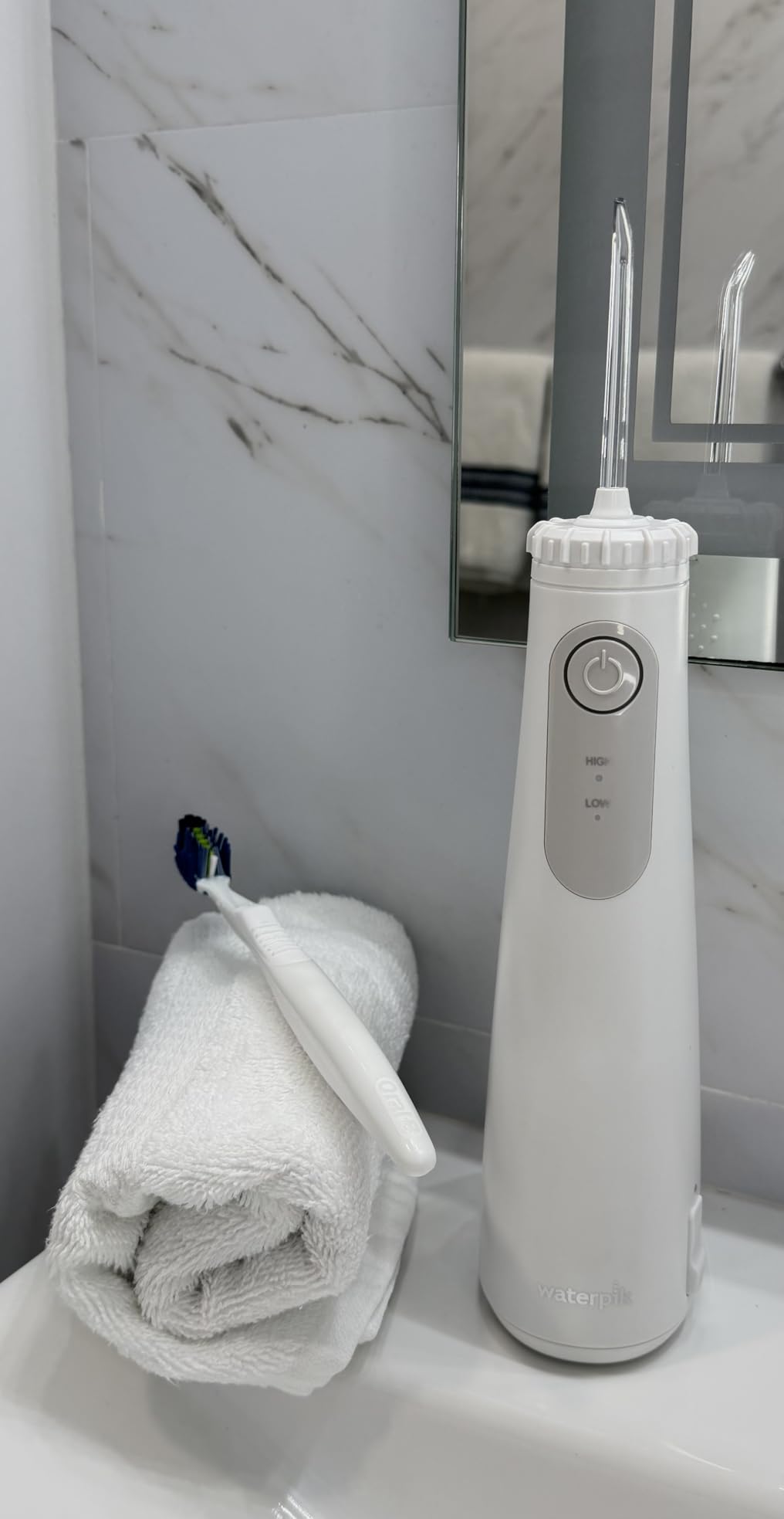 Waterpik Cordless Gem Water Flosser 5100 for Travel and Home, Rechargeable, Portable, Waterproof for Shower, Daily Gum Care, Cleaning Teeth, Braces, Implants, 3 Flossing Tips, ADA Accepted White WF-27 customer photo 2