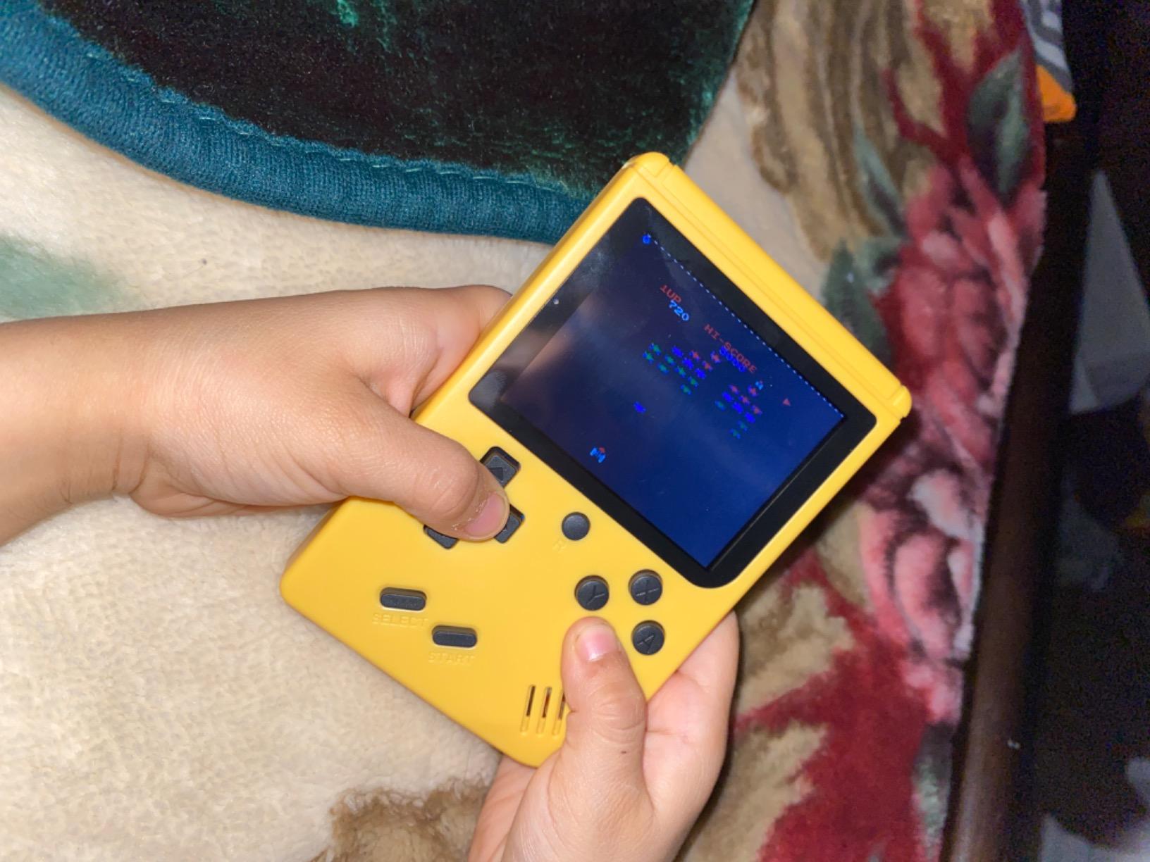 Retro Handheld Games Console for Kids/Adults, 168 Classic 8 Bit Games 3 inch Screen Video Games with AV Cable Play on TV (White) customer photo 1