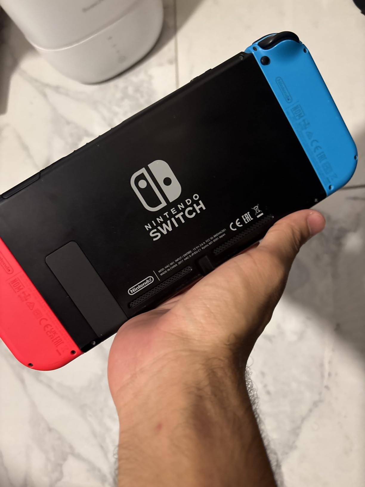 Nintendo Switch with Neon Blue and Red Joy-Con (Renewed) customer photo 1