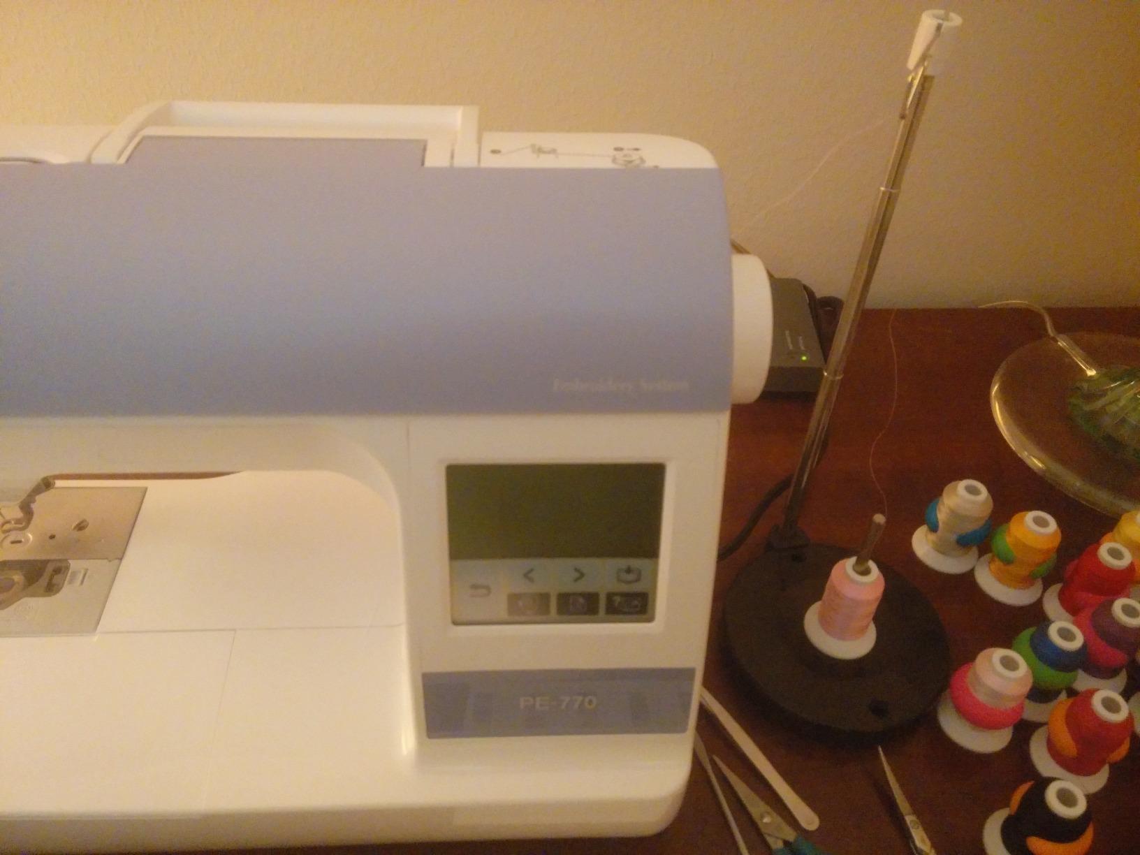 Adjustable Single Thread Spool Holder – Stand alone Embroidery, Sewing or Quilting Thread Holder or Stand – Ensures Smoother Feed = Heavy Plastic Base customer photo 1