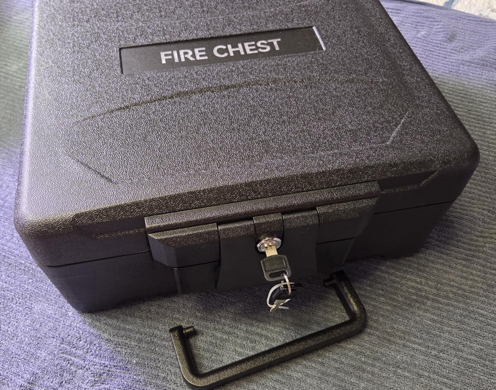 Amazon Basics Fire-Resistant Waterproof Fire Chest with Mechanical Key, Protects During Floods, 0.39 cu. ft, Black customer photo 2
