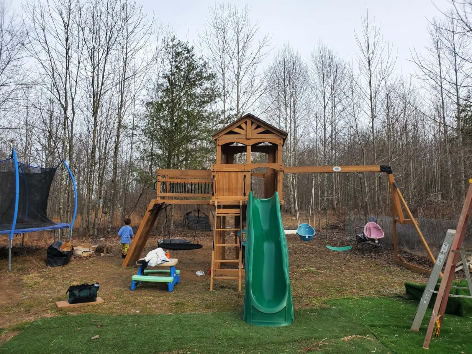 Backyard Discovery Dover Bay Spruce Wood Swing Set with Wave Slide, Clubhouse, Monkey Bars, Rock Wall, Belt Swings, Step Ladder, Toy Telescope, Chalkboard, Outdoor Playset customer photo 1